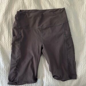Fabletics purple Bike Shorts with pockets; power hold